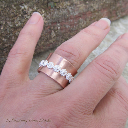 Handcrafted Sterling Silver Floral Spinner Ring with Uncoated Copper Band