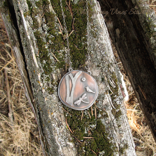 A Woodland Pendant Necklace in Sterling Silver and Copper
