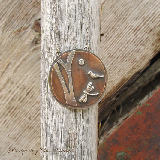 A Woodland Pendant Necklace in Sterling Silver and Copper